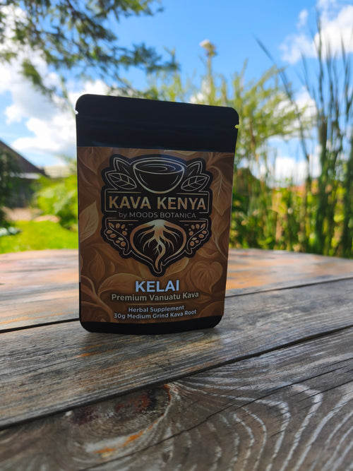 Kava Kenya Kelai package on a wooden surface with a blurred natural background