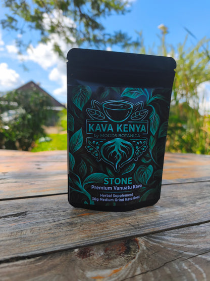 Kava Kenya Stone packaging on a wooden surface with a natural background